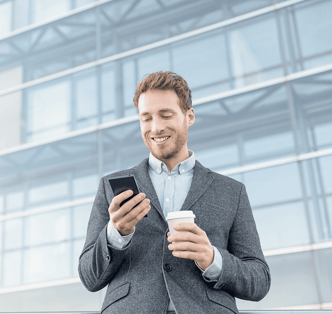 An Anytime Capital team member outside the office